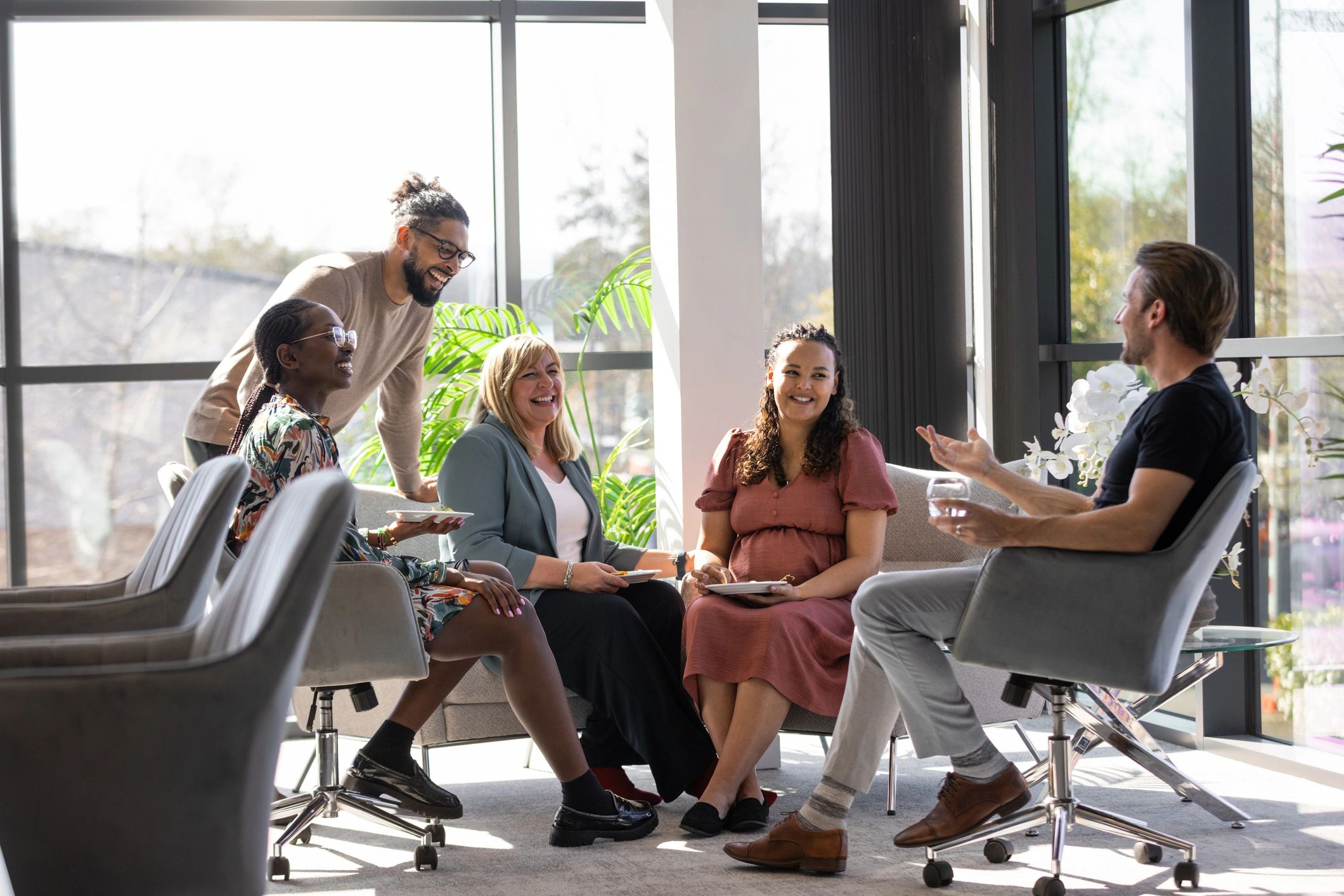 Creative team collaborating in a bright workspace